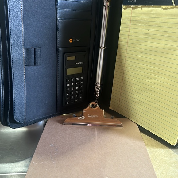 Allan’s  portfolio with calculator also with Staples clipboard unopened - Picture 6 of 9